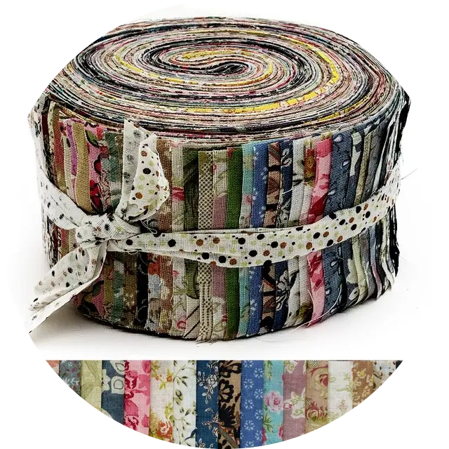 A flat lay of colorful craft supplies including scissors, adhesive tape, a spool of ribbon, and a sheet of decorative stickers on a clean white desk.